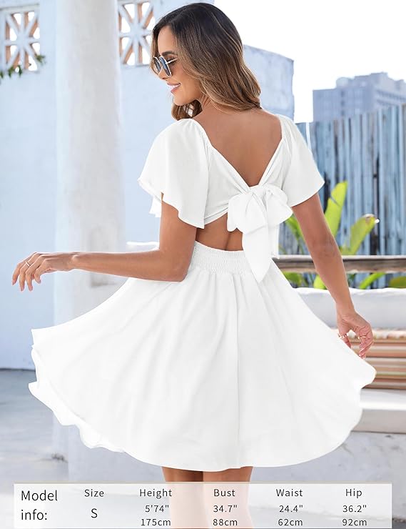 Damklänning med hjärtformad halsringning och knut framtill