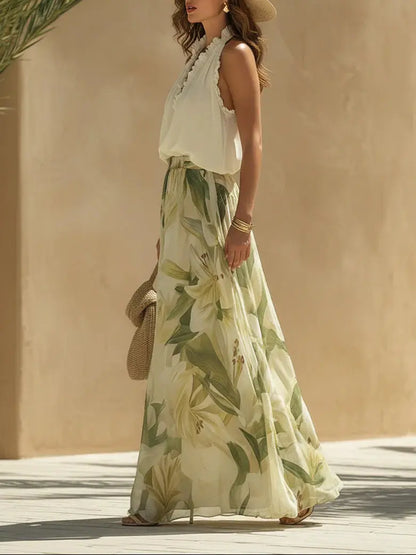 Ensemble de vacances composé d'un haut sans manches en mousseline à volants et d'un pantalon à imprimé lys