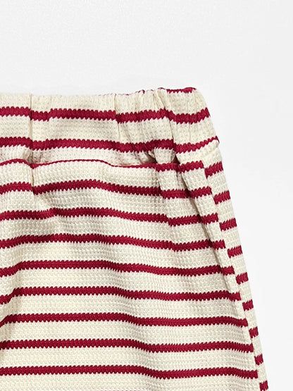 Set med randig tubtop och byxor med vida ben för damer