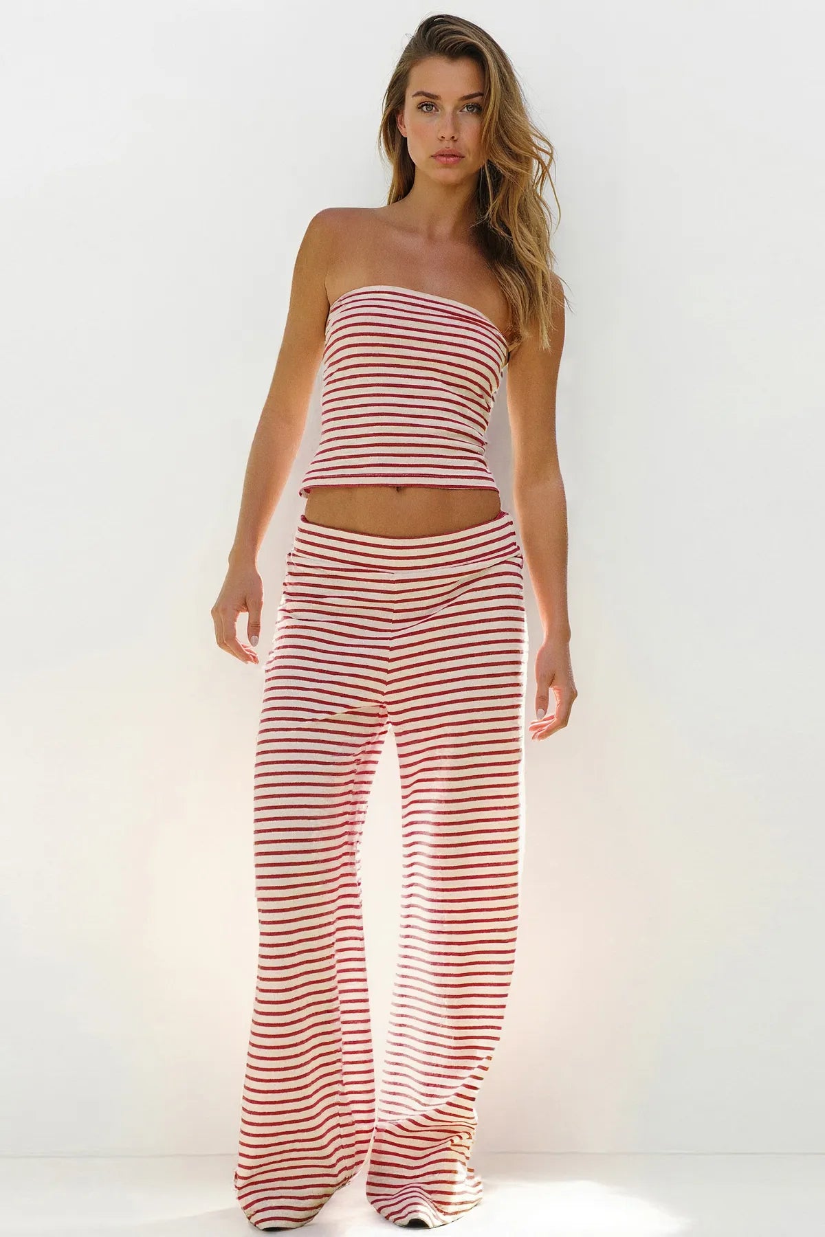 Set med randig tubtop och byxor med vida ben för damer