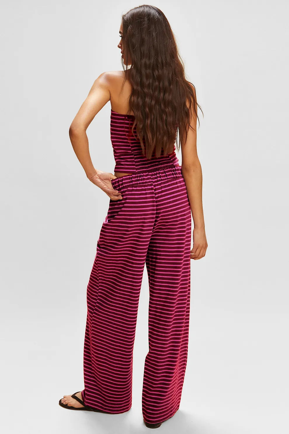 Set med randig tubtop och byxor med vida ben för damer