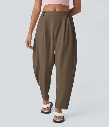 Dambyxor med medelhöjd midja, fickor och rundade ben – arbetsbyxor