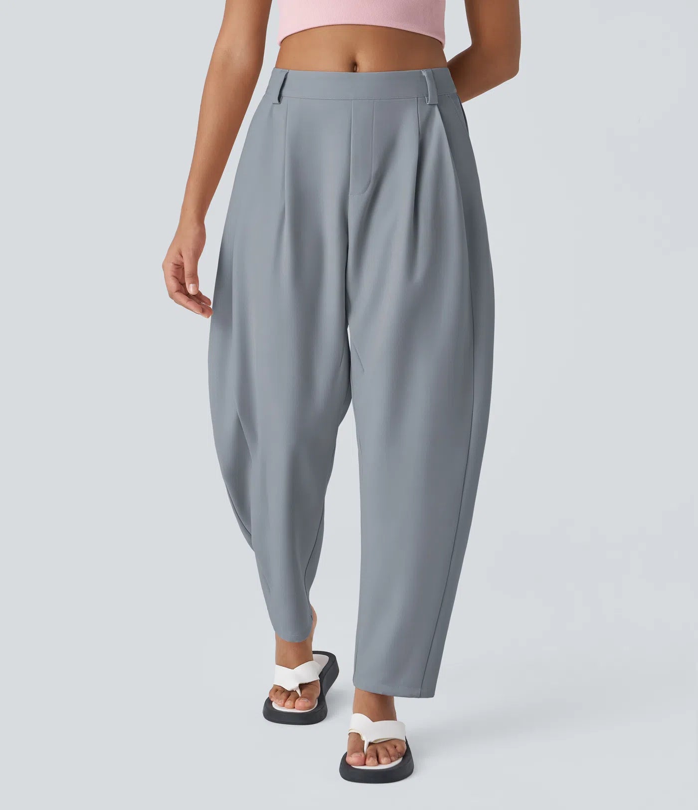 Dambyxor med medelhöjd midja, fickor och rundade ben – arbetsbyxor