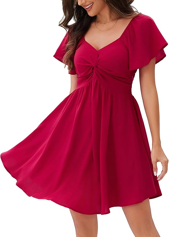 Damklänning med hjärtformad halsringning och knut framtill