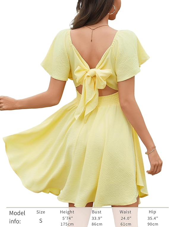 Damklänning med hjärtformad halsringning och knut framtill