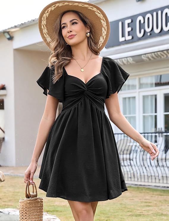 Damklänning med hjärtformad halsringning och knut framtill