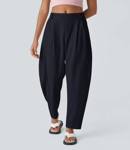 Dambyxor med medelhöjd midja, fickor och rundade ben – arbetsbyxor