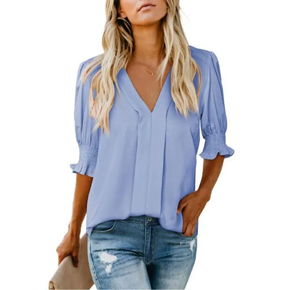 Joli haut à col en V et manches à volants