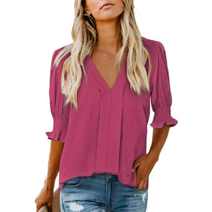 Joli haut à col en V et manches à volants