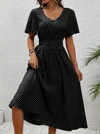 Elegant sommarklänning med prickar för damer