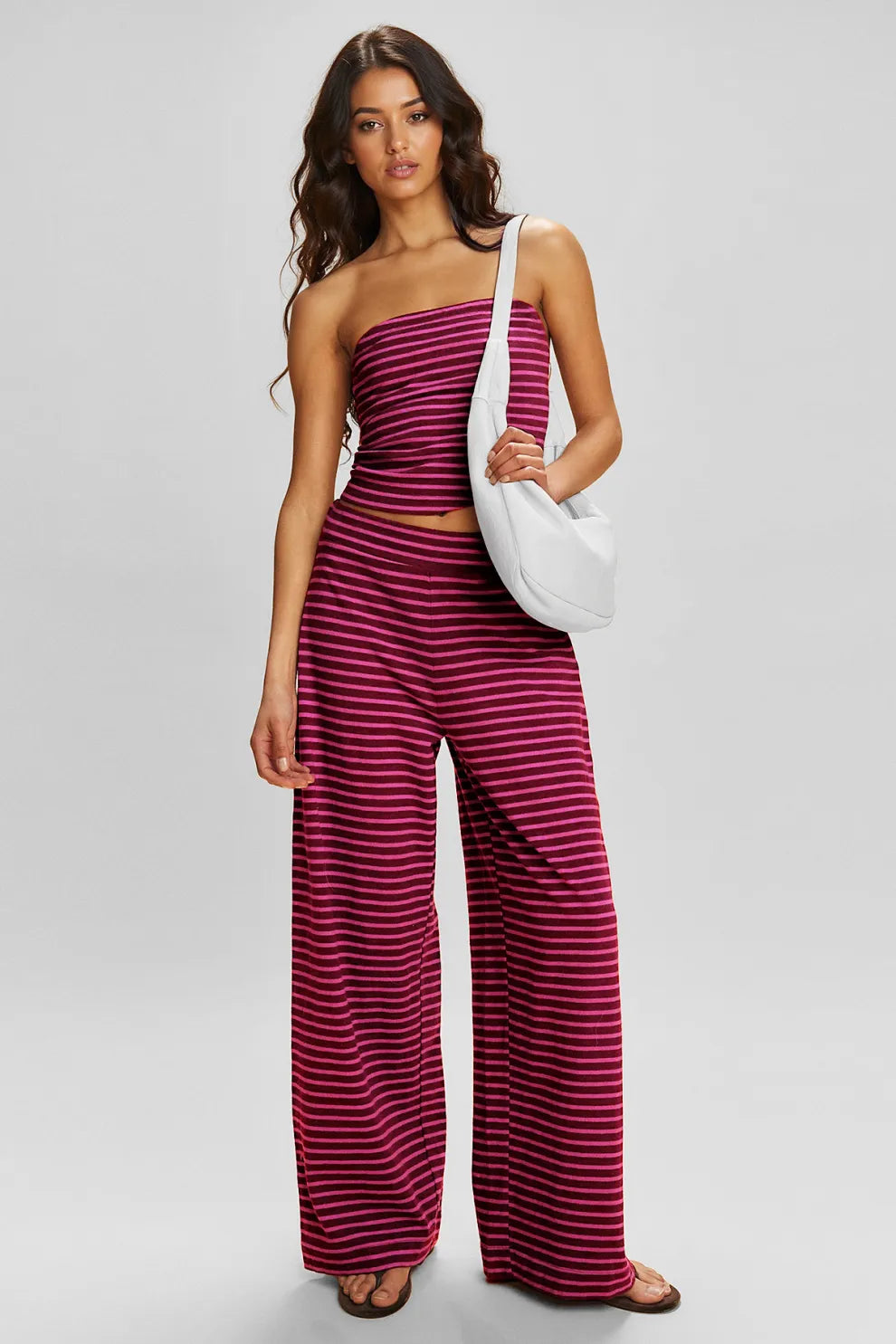 Set med randig tubtop och byxor med vida ben för damer